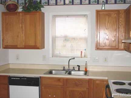 2000 Pineton Court Raleigh, NC 27610 - Photo 6 of 12 Ergonomically designed kitchen with plenty of cabinet space. Off kitchen laundry room doubles as a pantry Other