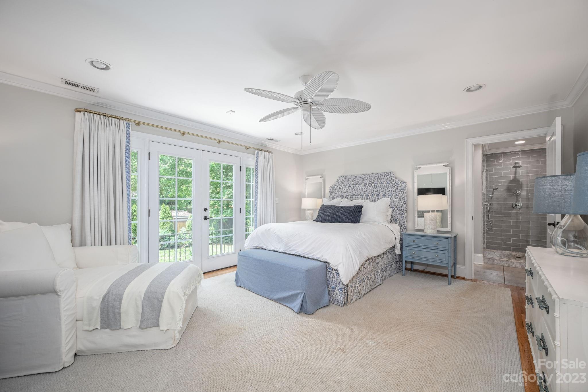1001 Sedgefield Road Charlotte, NC 28209 - Photo 13 of 30 a spacious bedroom with a bed and a large window