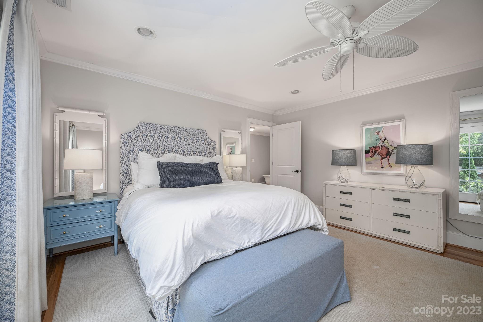 1001 Sedgefield Road Charlotte, NC 28209 - Photo 14 of 30 a bedroom with a bed and a dresser
