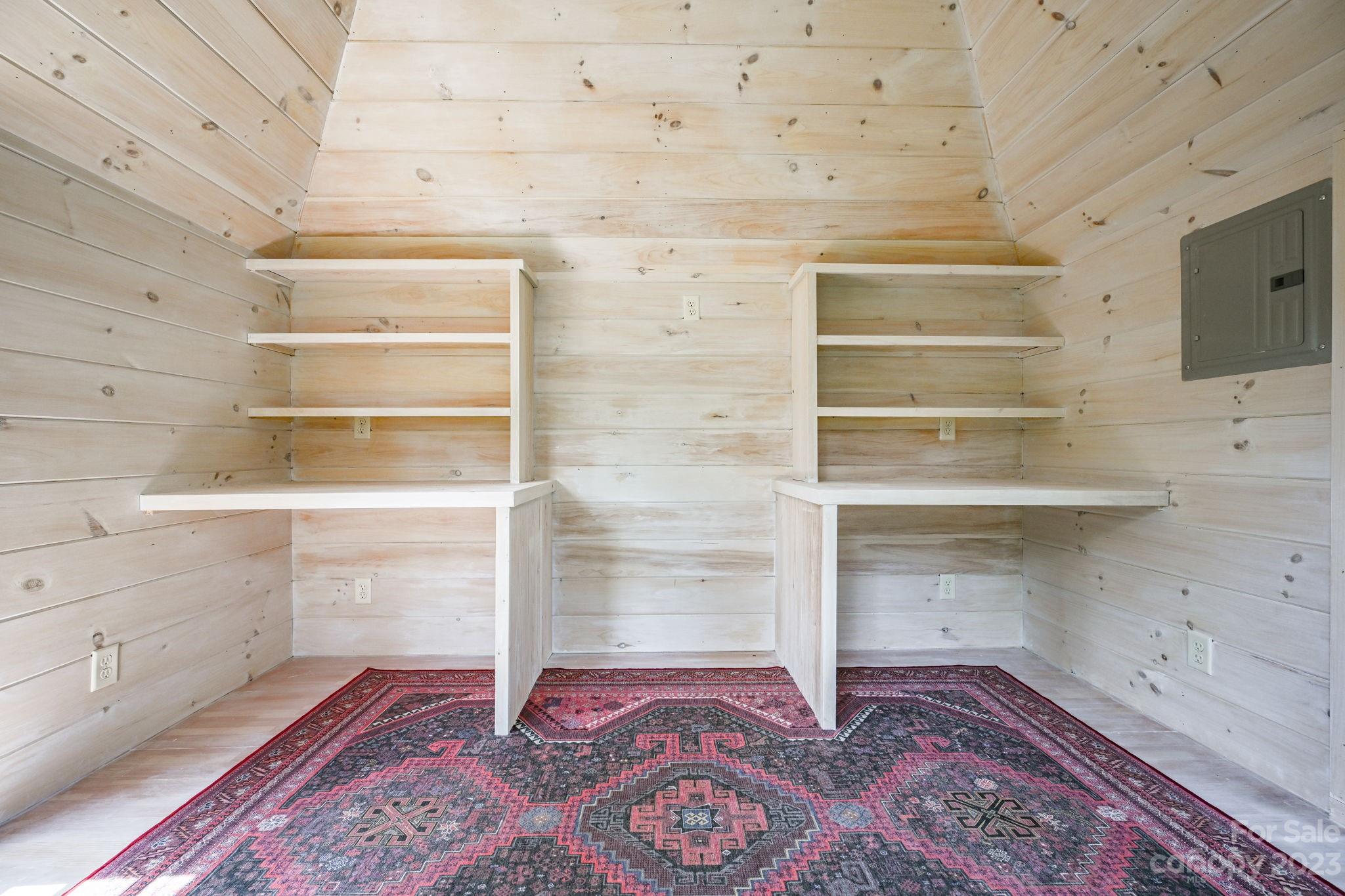 1001 Sedgefield Road Charlotte, NC 28209 - Photo 27 of 30 a room with shelves