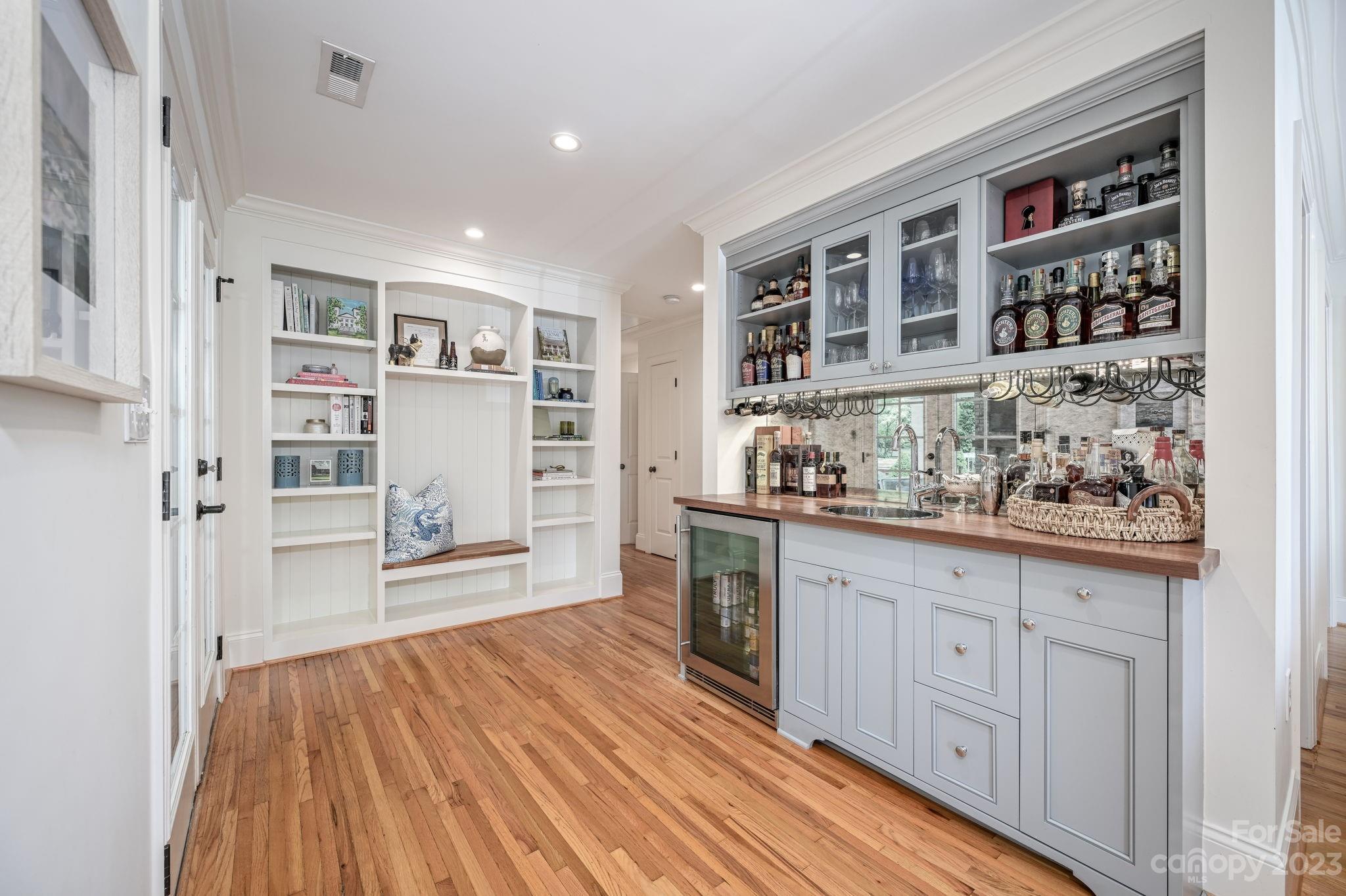 1001 Sedgefield Road Charlotte, NC 28209 - Photo 9 of 30 a room with stainless steel appliances wooden floor and floors
