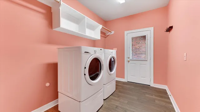 a utility room with dryer and washer