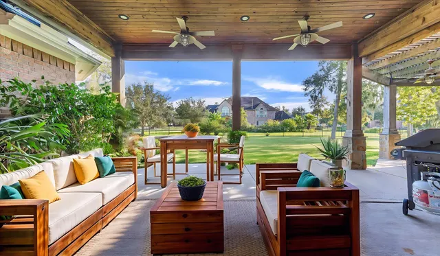 a outdoor living space with patio furniture and a potted plant