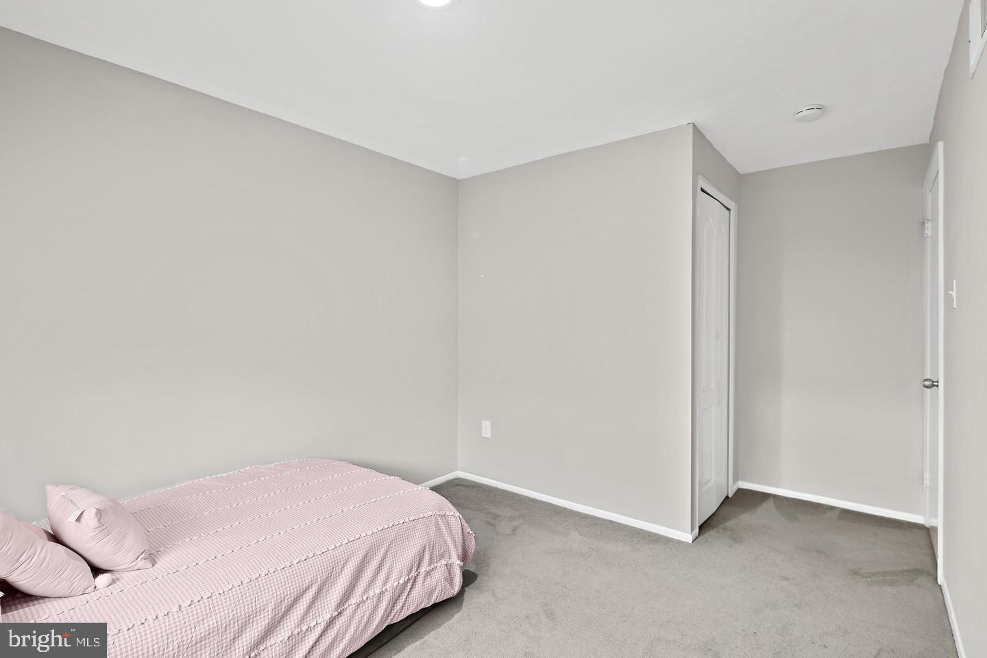 7068 Winter Rose Path Columbia, MD 21045 - Photo 20 of 30 a bedroom with a bed and a window