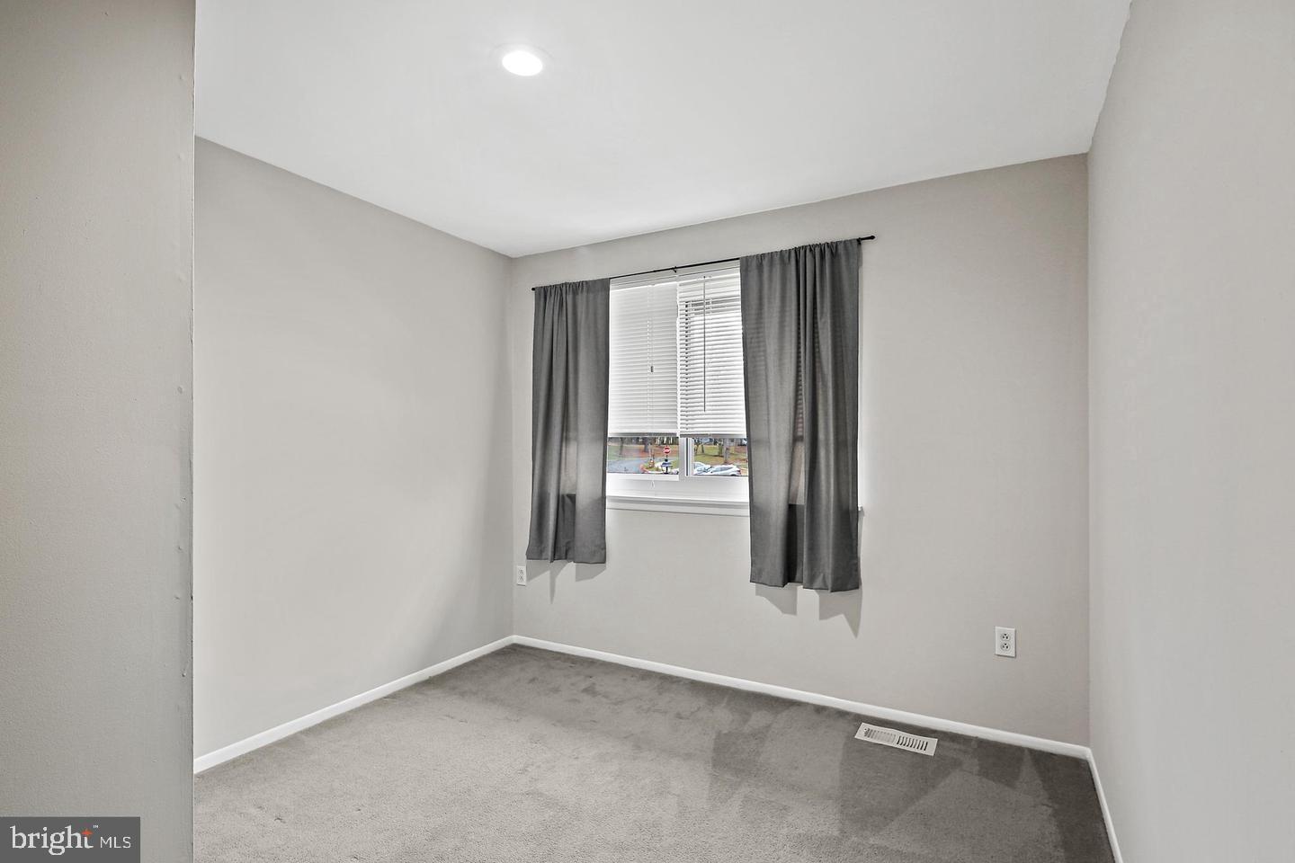7068 Winter Rose Path Columbia, MD 21045 - Photo 26 of 30 an empty room with windows