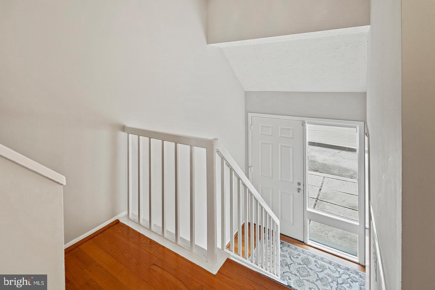 7068 Winter Rose Path Columbia, MD 21045 - Photo 4 of 30 a view of a hallway with staircase