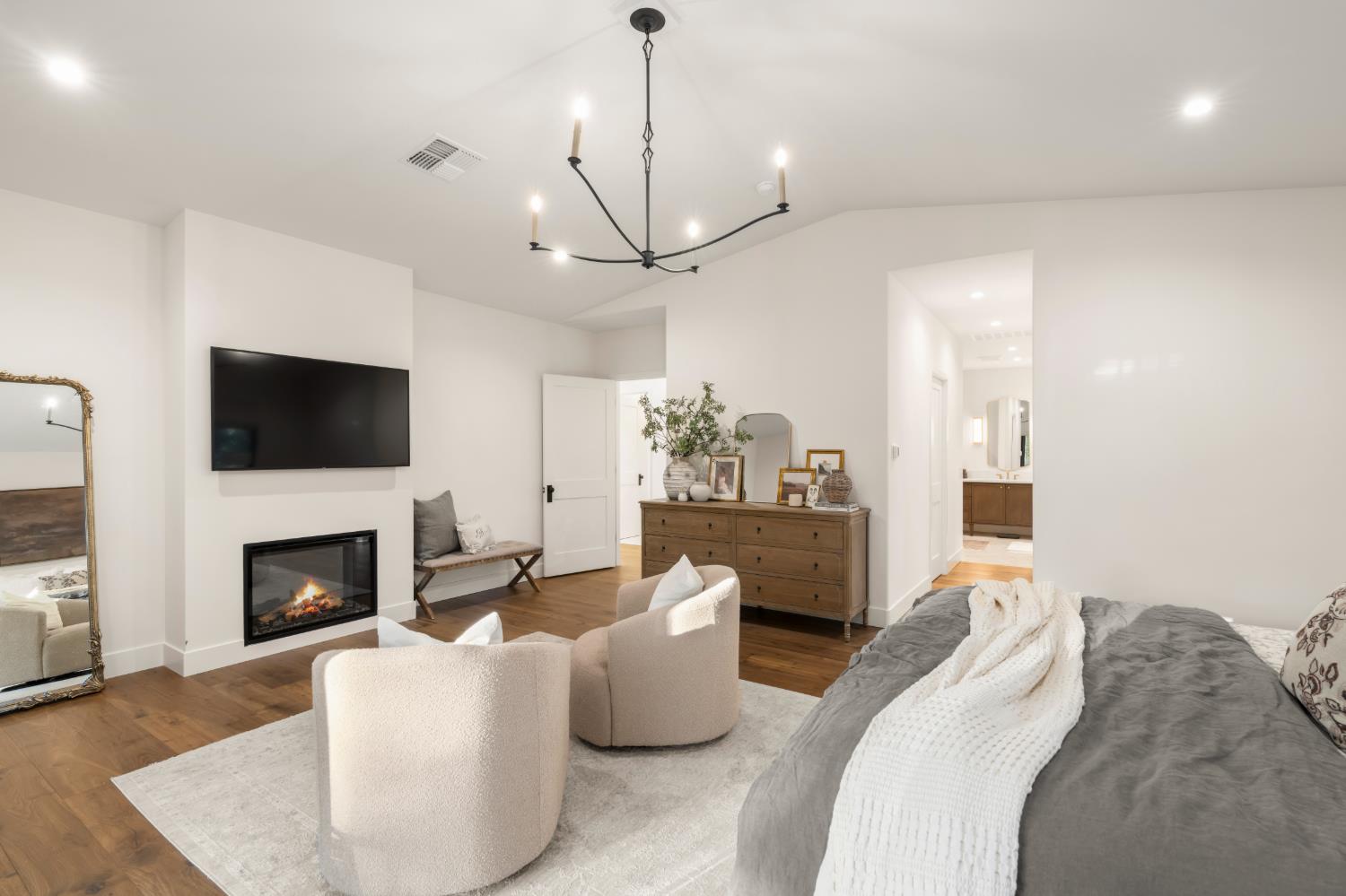 7697 Horseshoe Bar Road Loomis, CA 95650 - Photo 24 of 76 a living room with furniture fireplace and flat screen tv