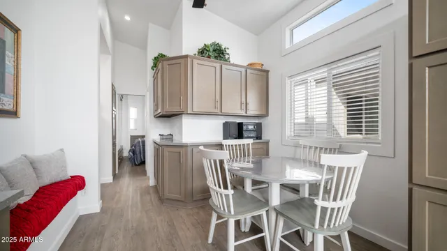 a white toilet sitting next to a bathroom sink