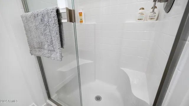 a front view of a house with parking area