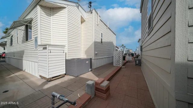 a front view of a building with outdoor seating