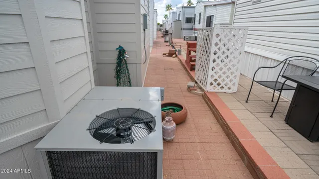 a view of a room and wooden fence