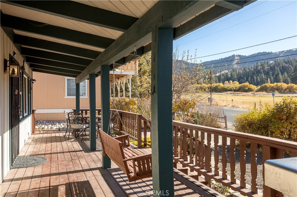 43014 Moonridge Road Big Bear Lake, CA 92315 - Photo 2 of 22 a view of balcony with couch