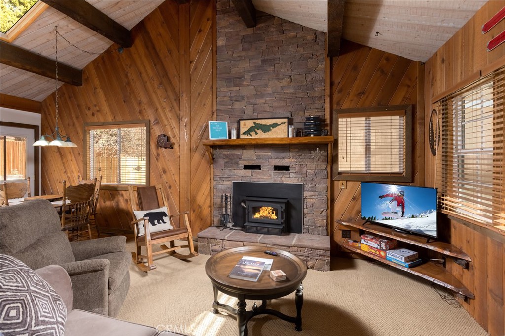 43014 Moonridge Road Big Bear Lake, CA 92315 - Photo 10 of 22 a living room with furniture and a fireplace