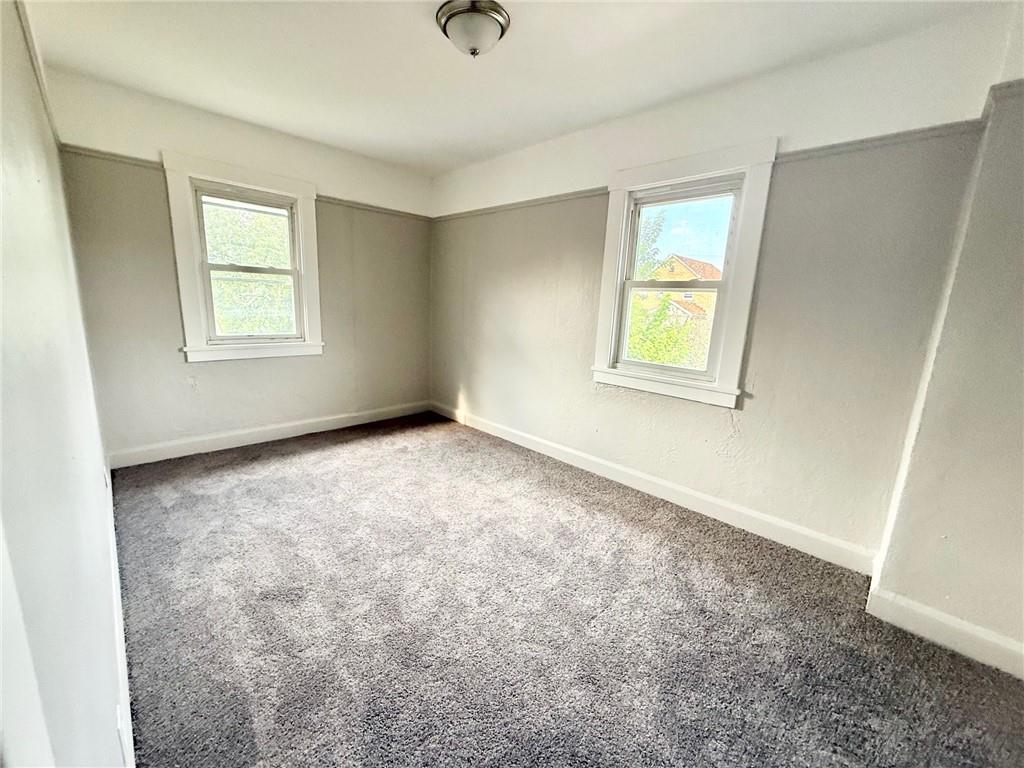 864 Vankirk Street Clairton, PA 15025 - Photo 8 of 10 an empty room with windows