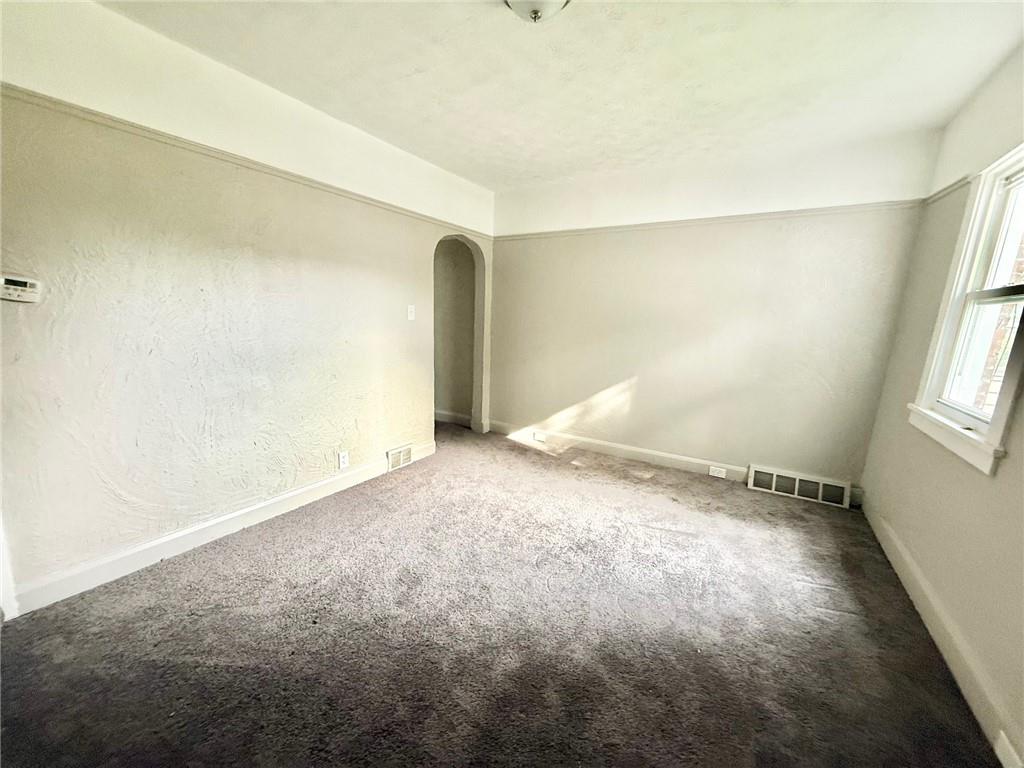 864 Vankirk Street Clairton, PA 15025 - Photo 9 of 10 an empty room with windows