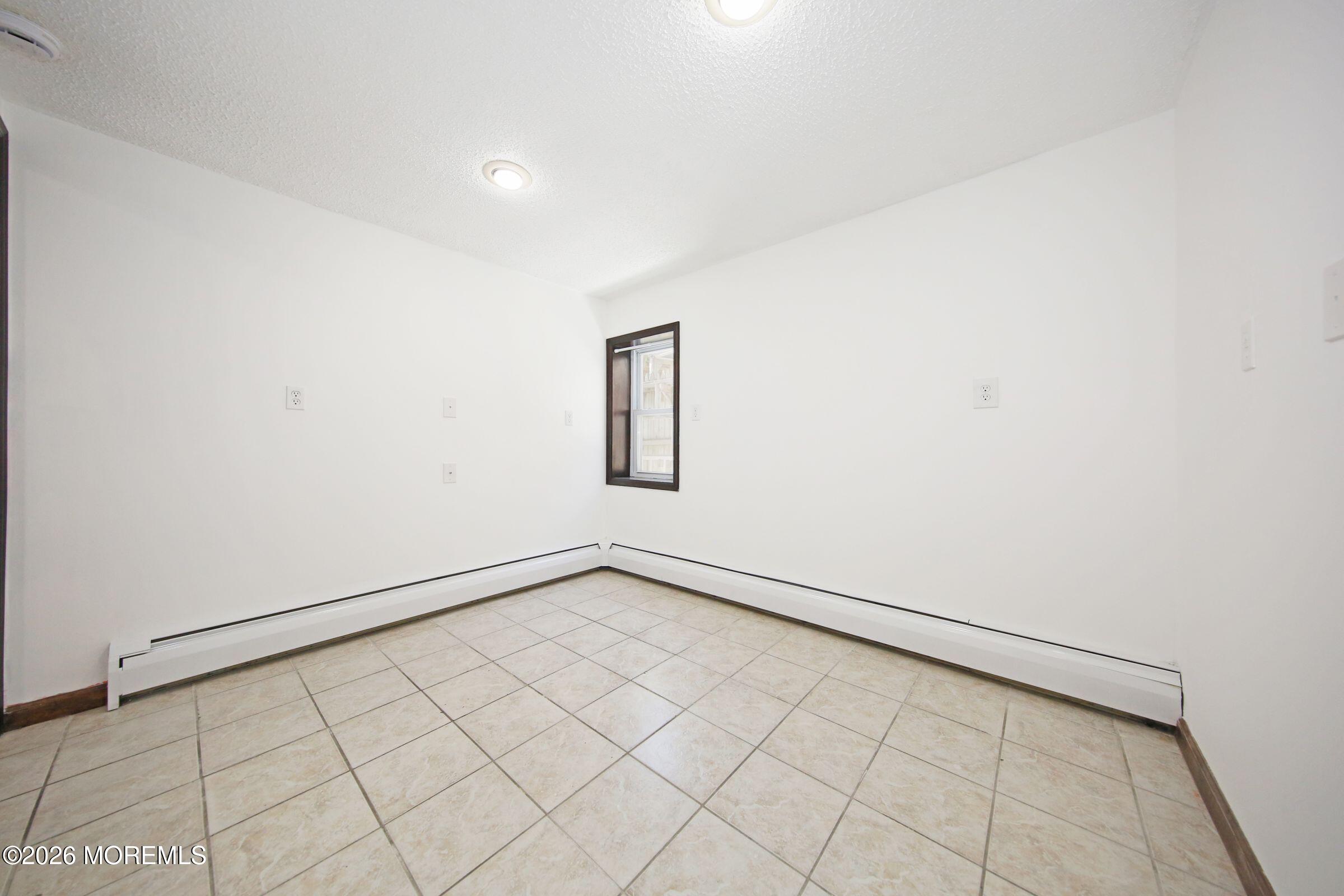 60 Matthew Street, Unit 1 Highlands, NJ 07732 - Photo 19 of 33 a view of an empty room