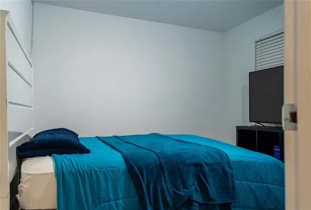 a view of a house with porch and furniture