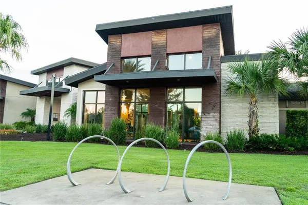 a view of a swimming pool with a patio