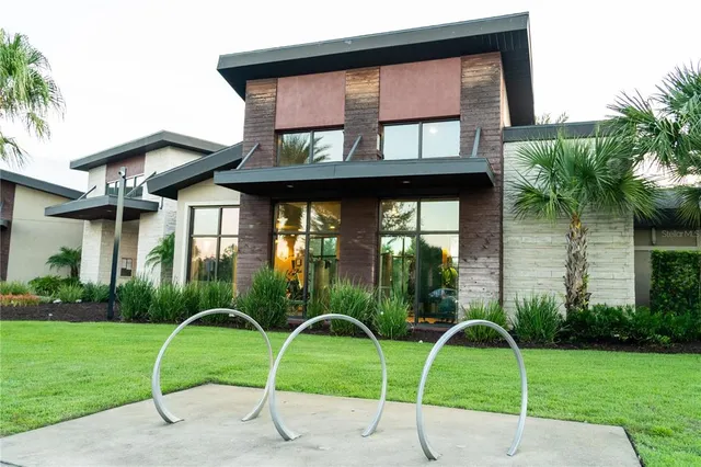 a view of a swimming pool with a patio