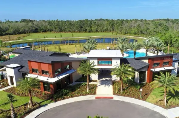 a view of a house with a swimming pool