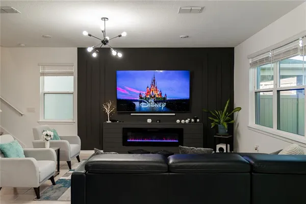 a kitchen with a sink cabinets and appliances