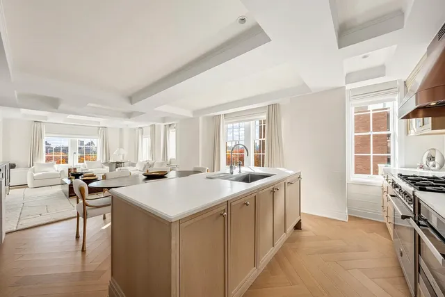 a open kitchen with stainless steel appliances granite countertop a lot of counter space and a sink