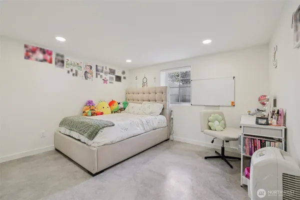 a living room with furniture and a table