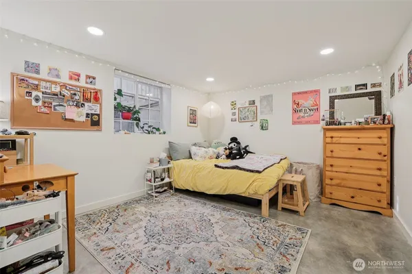 a bed room with a bed and furniture