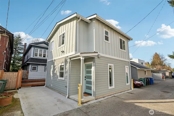 a front view of a house with a garage