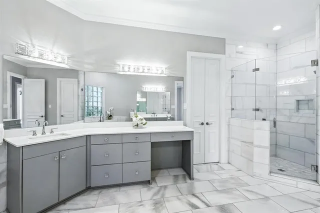 a white bath tub sitting in a bathroom