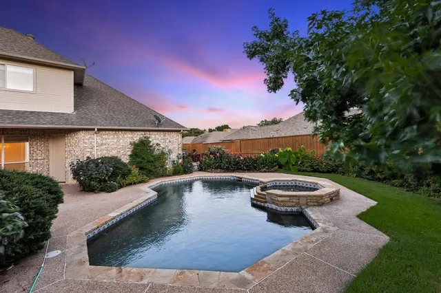 a view of swimming pool from a lounge chair