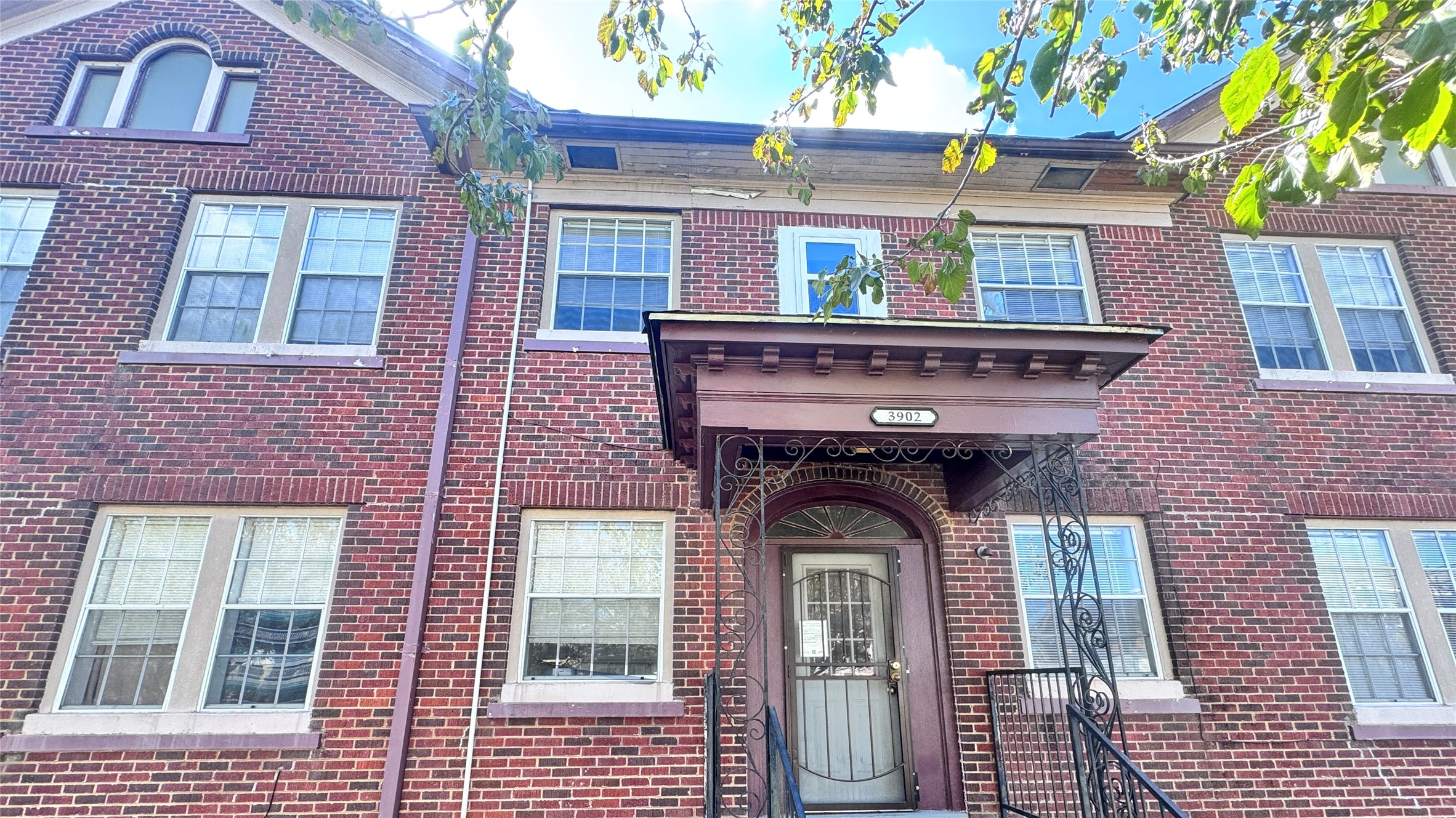 a front view of a house with a garage