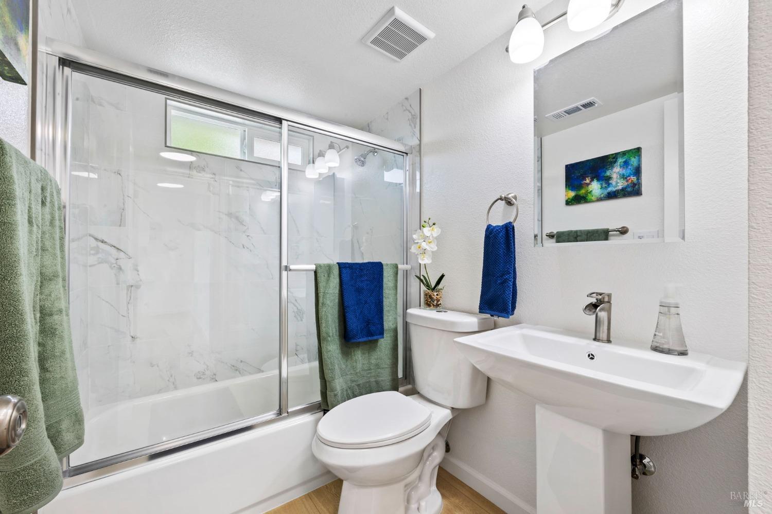 240 Rinaldo Drive Vallejo, CA 94589 - Photo 20 of 41 a bathroom with a sink toilet and shower