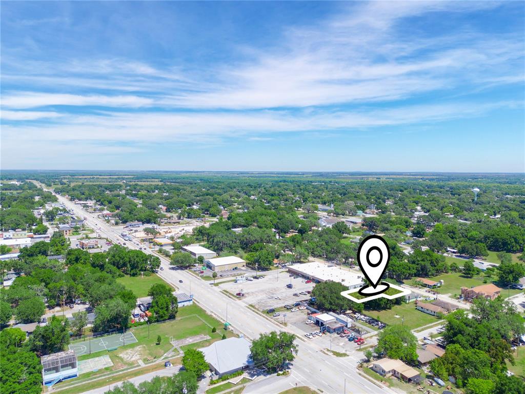 Lanier Avenue Fort Meade, FL 33841 - Photo 20 of 22 an aerial view of a city with lots of residential buildings