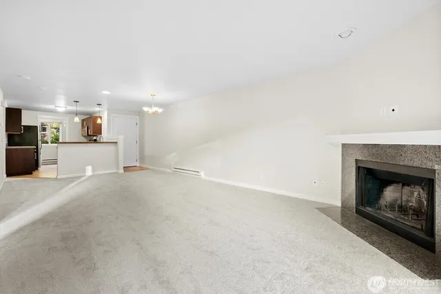 a view of a livingroom with a fireplace and a fireplace