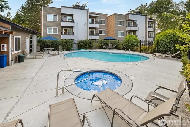 a view of a building with a yard