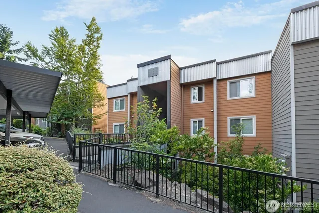a view of a house with brick walls
