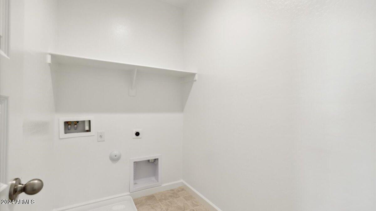 2077 West Sentiero Avenue Apache Junction, AZ 85120 - Photo 17 of 24 a view of white cabinet with a white cabinet