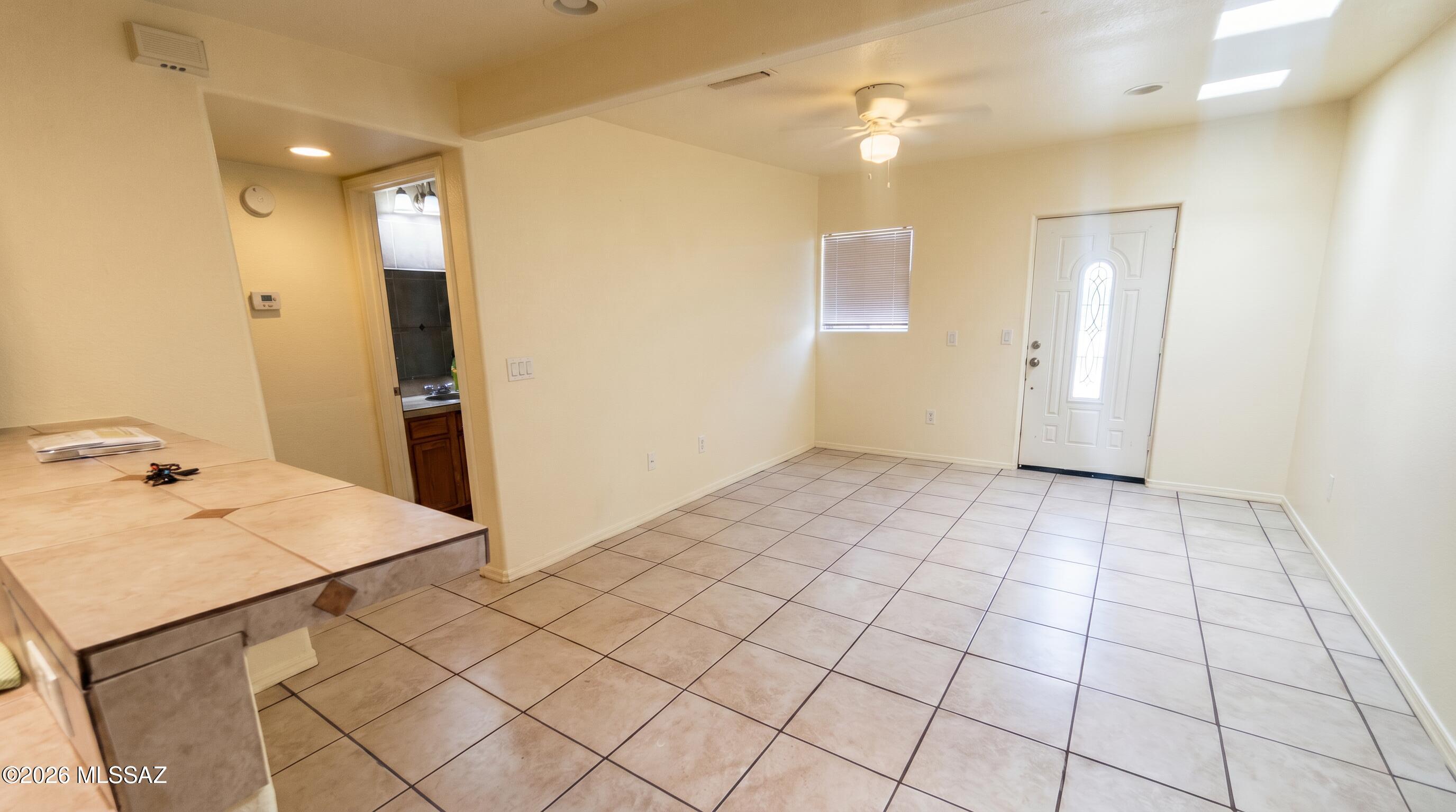 3658 East March Place Tucson, AZ 85713 - Photo 1 of 12 Firefly_Gemini Flash_Brighten photo, Re