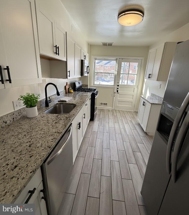 1102 Harwall Road Gwynn Oak, MD 21207 - Photo 2 of 18 Kitchen (virtually staged)