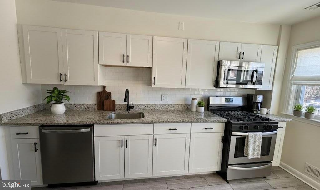 1102 Harwall Road Gwynn Oak, MD 21207 - Photo 4 of 18 Fully renovated kitchen