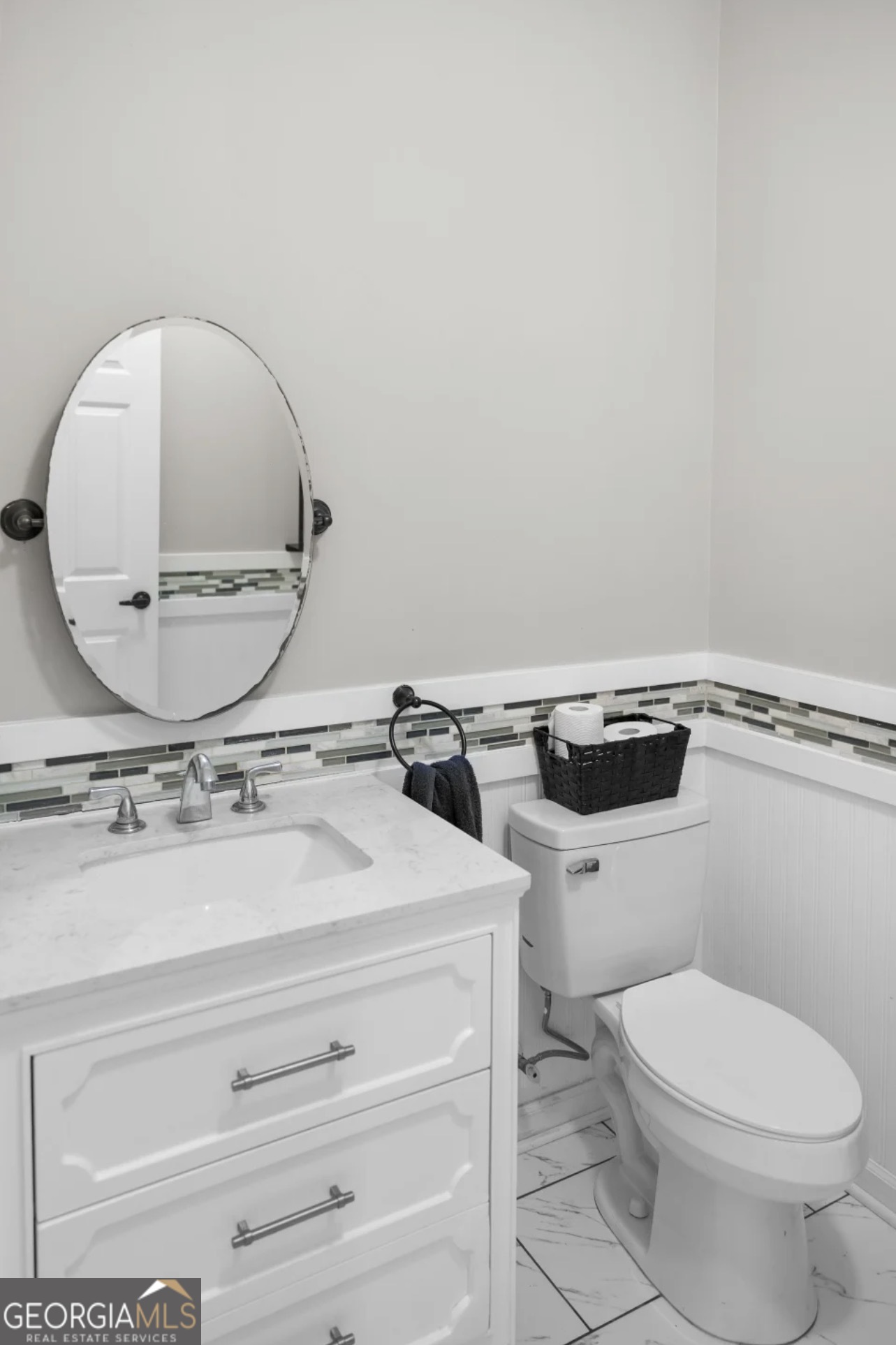 4430 Oak Hill Church Road Millen, GA 30442 - Photo 16 of 41 a bathroom with a sink mirror vanity and toilet