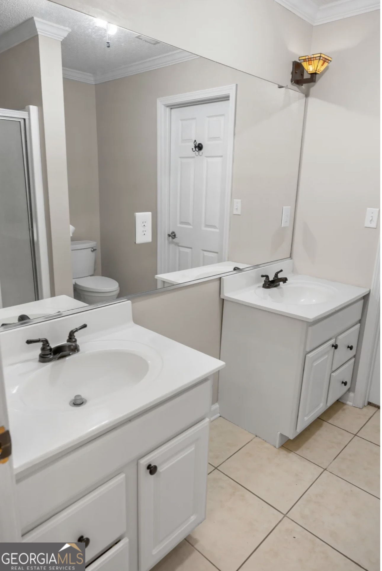4430 Oak Hill Church Road Millen, GA 30442 - Photo 25 of 41 a bathroom with a sink and a mirror