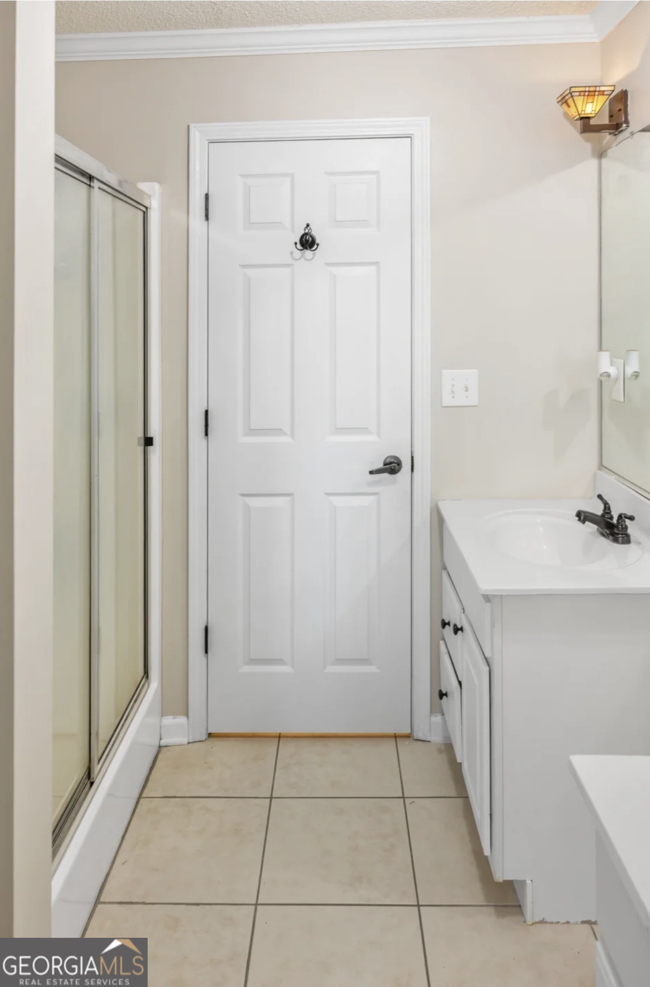 4430 Oak Hill Church Road Millen, GA 30442 - Photo 26 of 41 a bathroom with a sink a mirror and a shower