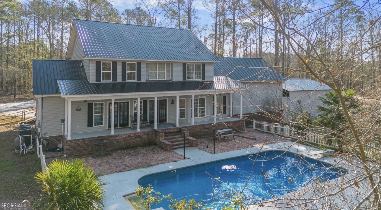 4430 Oak Hill Church Road Millen, GA 30442 - Photo 3 of 41 a view of a house with pool