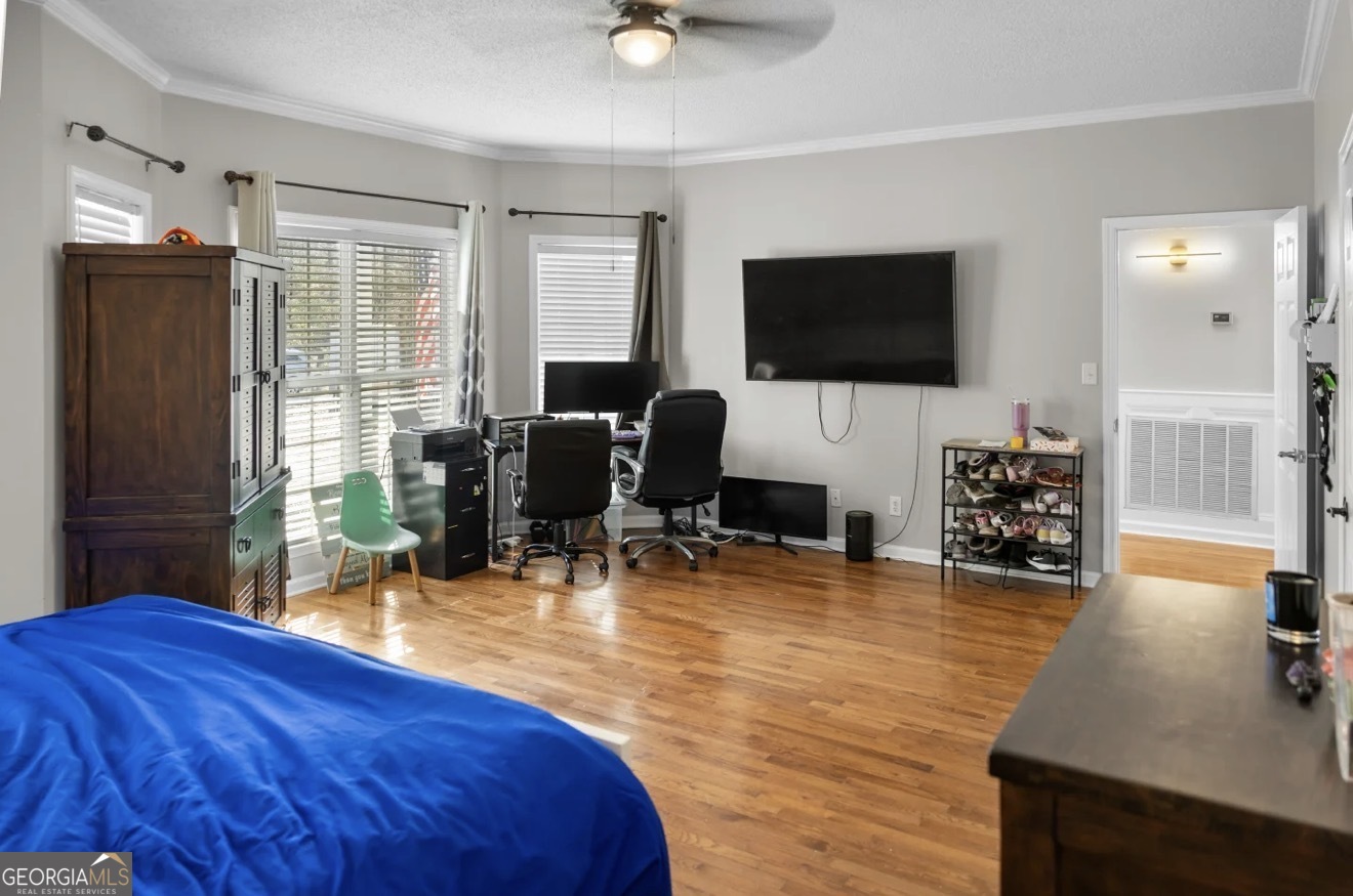 4430 Oak Hill Church Road Millen, GA 30442 - Photo 34 of 41 a living room with furniture and a flat screen tv