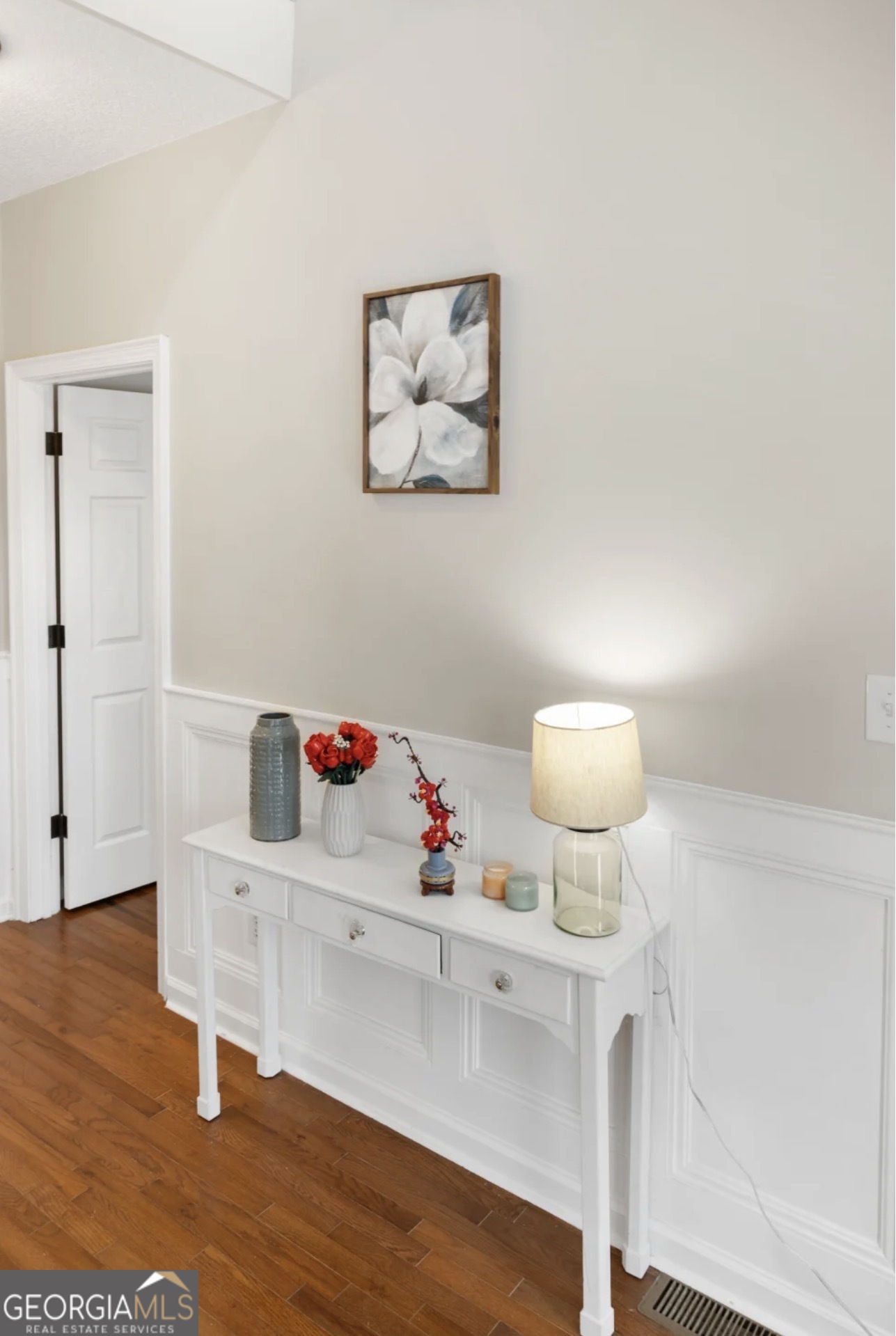 4430 Oak Hill Church Road Millen, GA 30442 - Photo 7 of 41 a room with a table and wooden floor