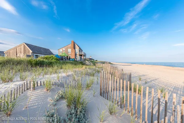a view of a house with a yard from a balcony