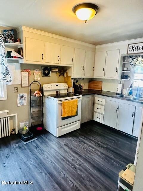 495 Union Street North Adams, MA 01247 - Photo 11 of 27 a kitchen with stainless steel appliances granite countertop a sink a stove and cabinets