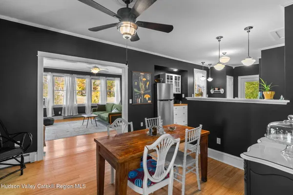 a kitchen with a sink appliances and cabinets